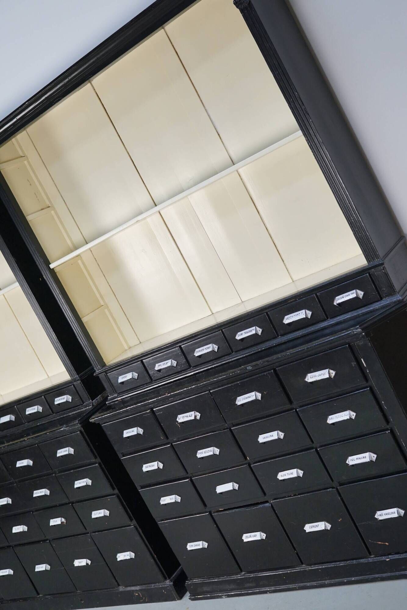 Large pair of antique apothecary cabinets painted black, Eastern Europe, 1910s