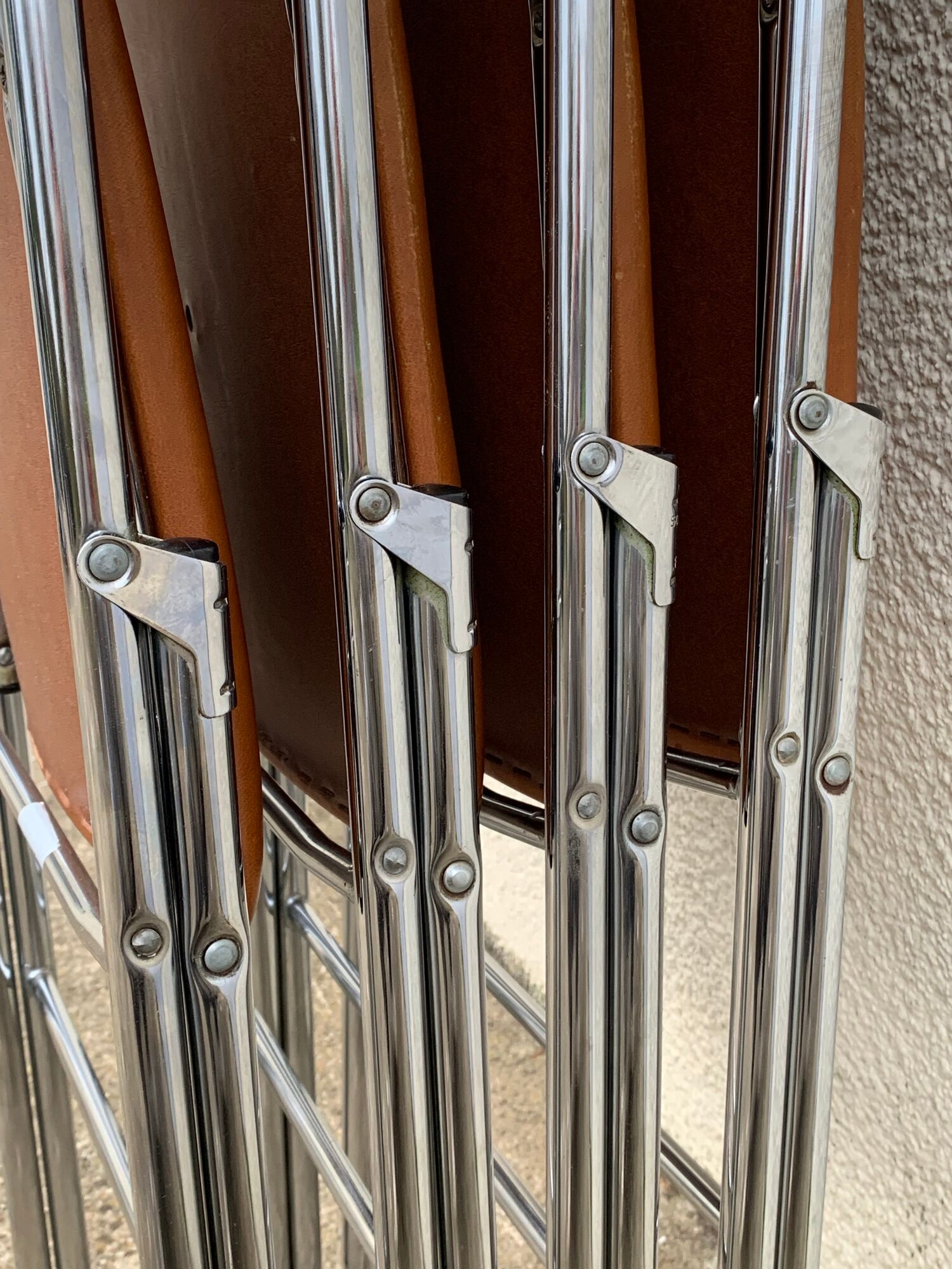 4 folding chairs chromed metal and Skaï fawn 1970