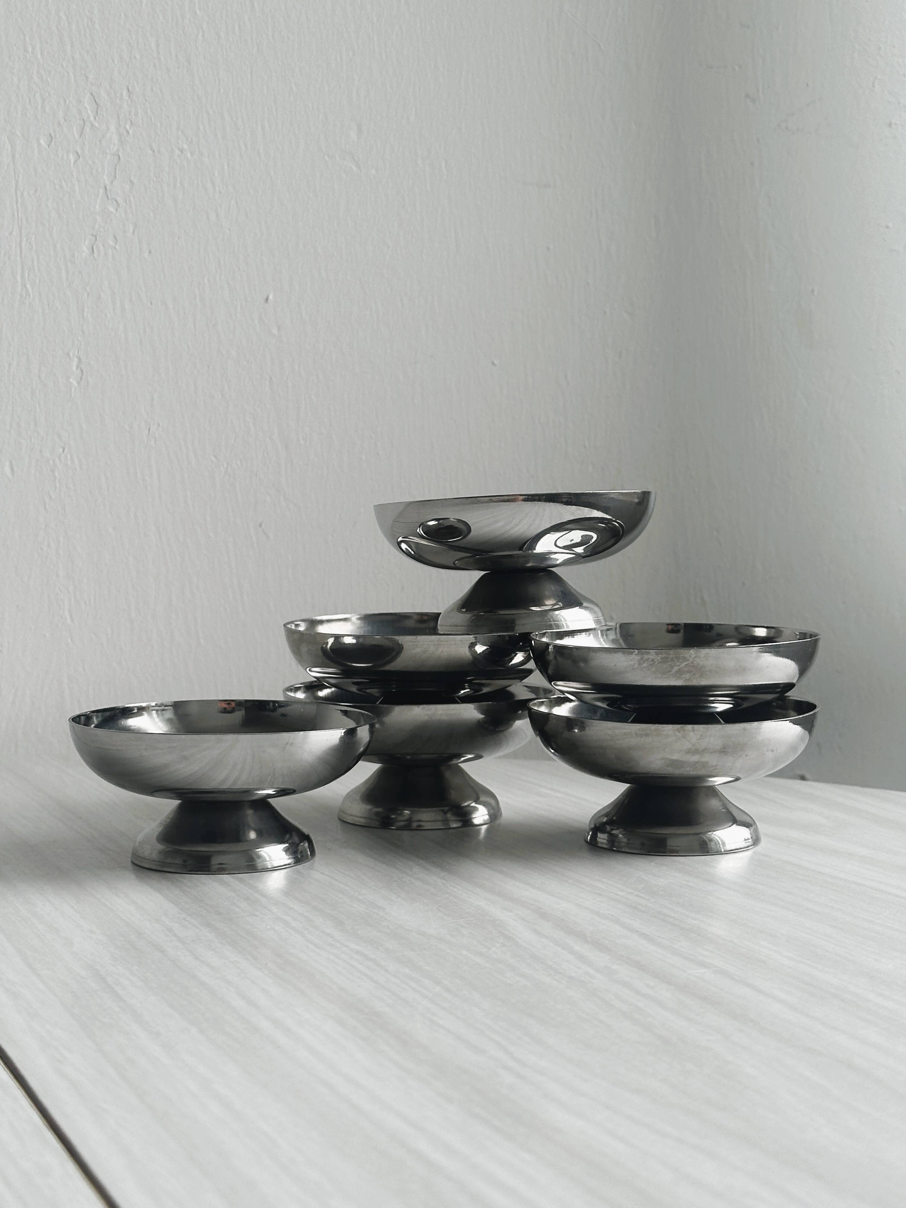 6 stainless steel dessert cups.