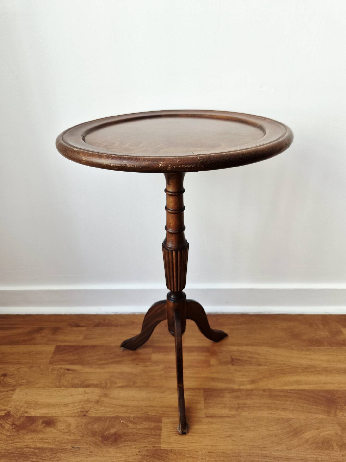 Small tripod wooden table with a vintage round top -