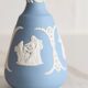 Blue porcelain vase by Wedgwood.