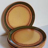 Six vintage stoneware plates with green net