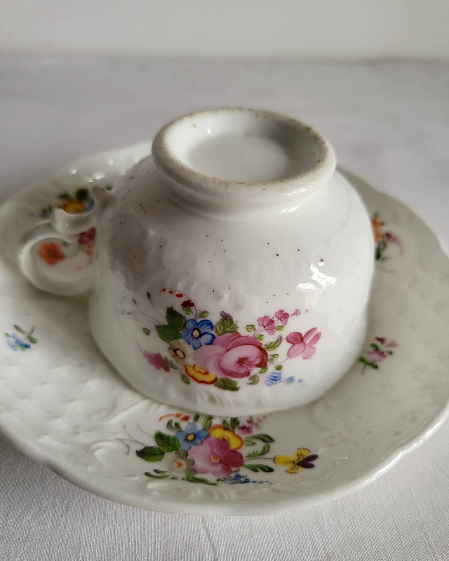 Antique Cup and Saucer in Porcelain with Hand-Painted Floral Decoration