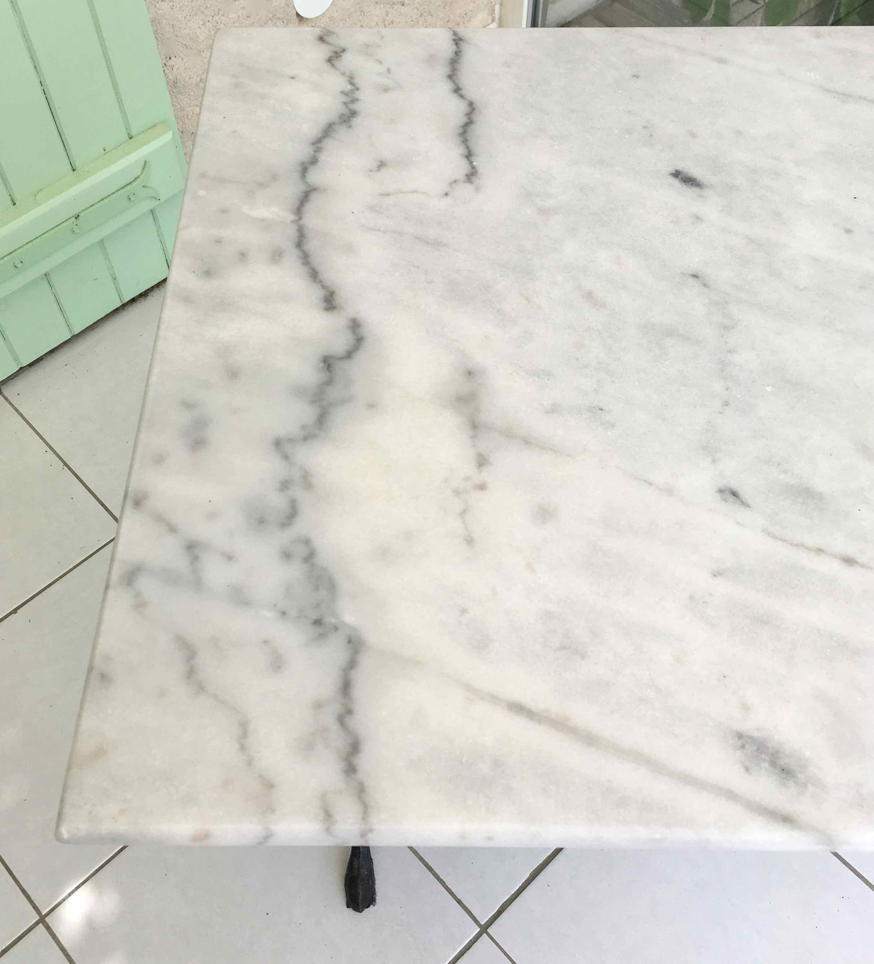 Marble and cast iron bistro table