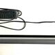 Black lacquered perforated metal table lamp with neon lighting - vintage from the 80s / 90s