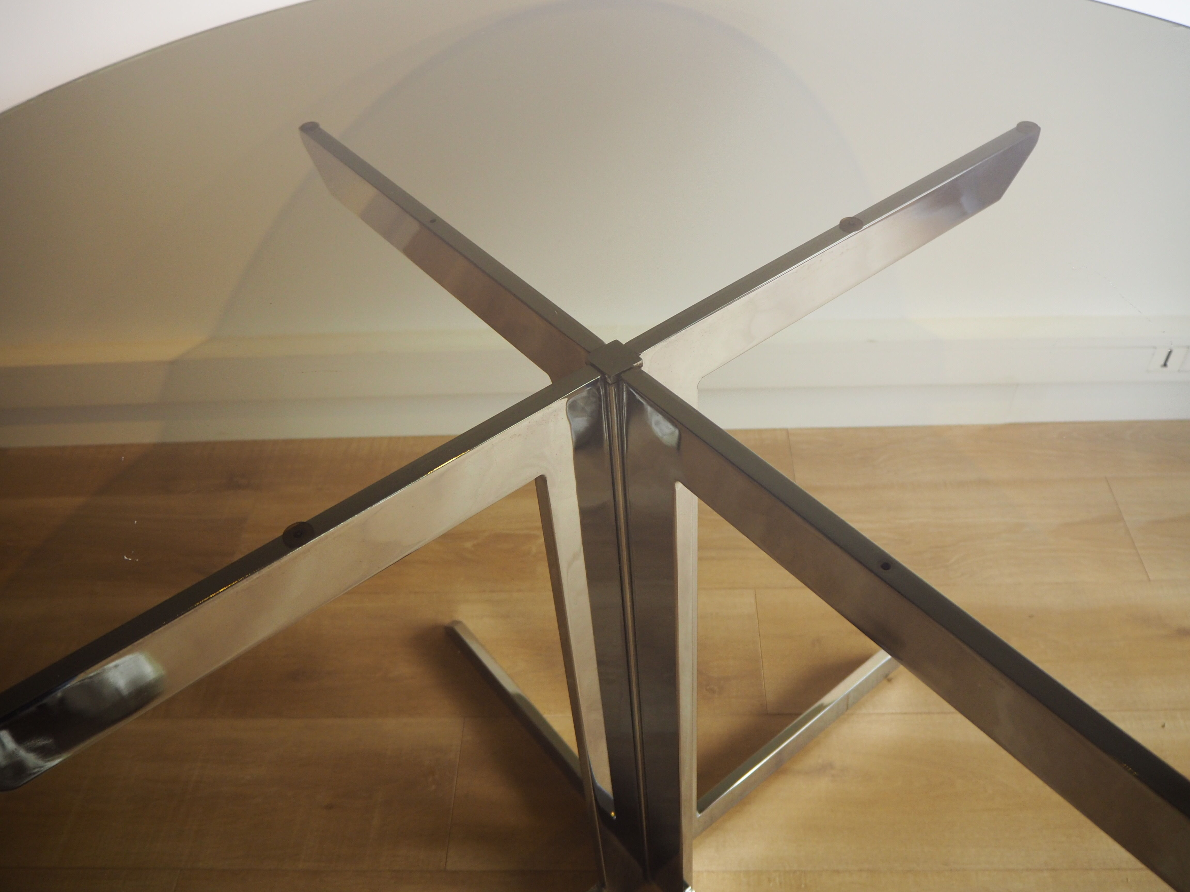 Smoked glass round dining table