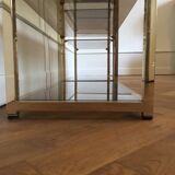 Pair of consoles brass shelves and smoked glass design Roche Bobois