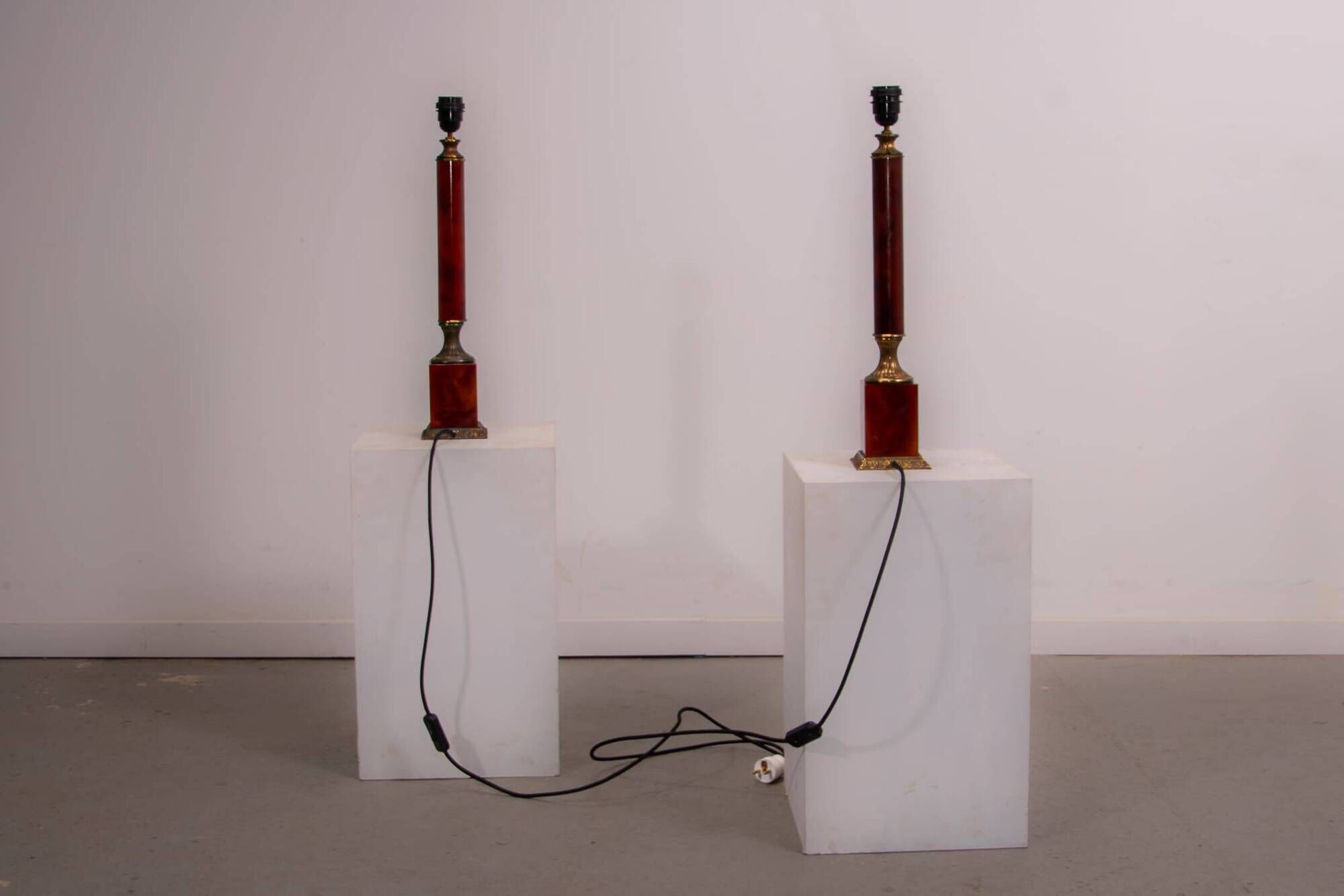 Set of French Empire style lamps made from amber bakelite and brass