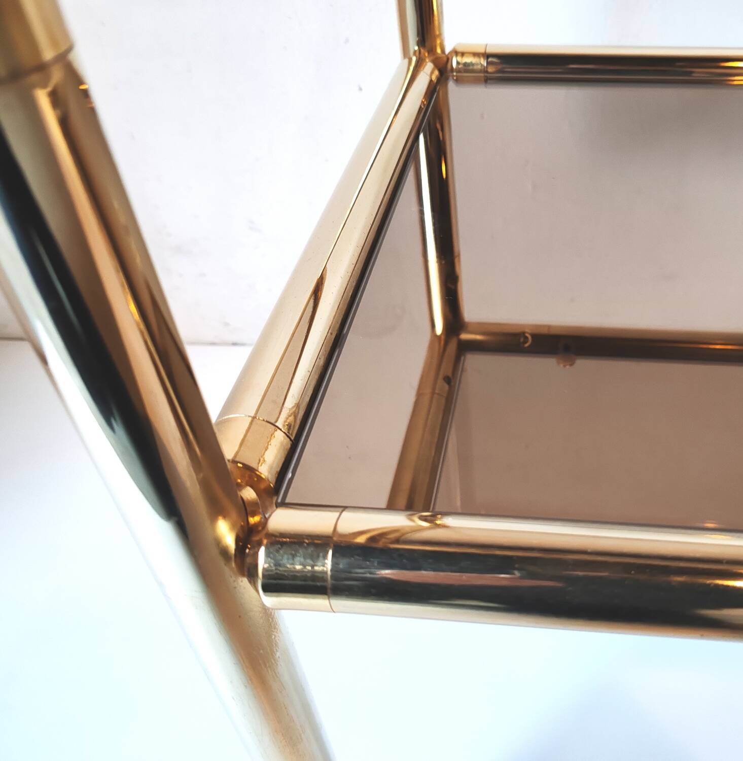 Brass and glass end table from the 70s