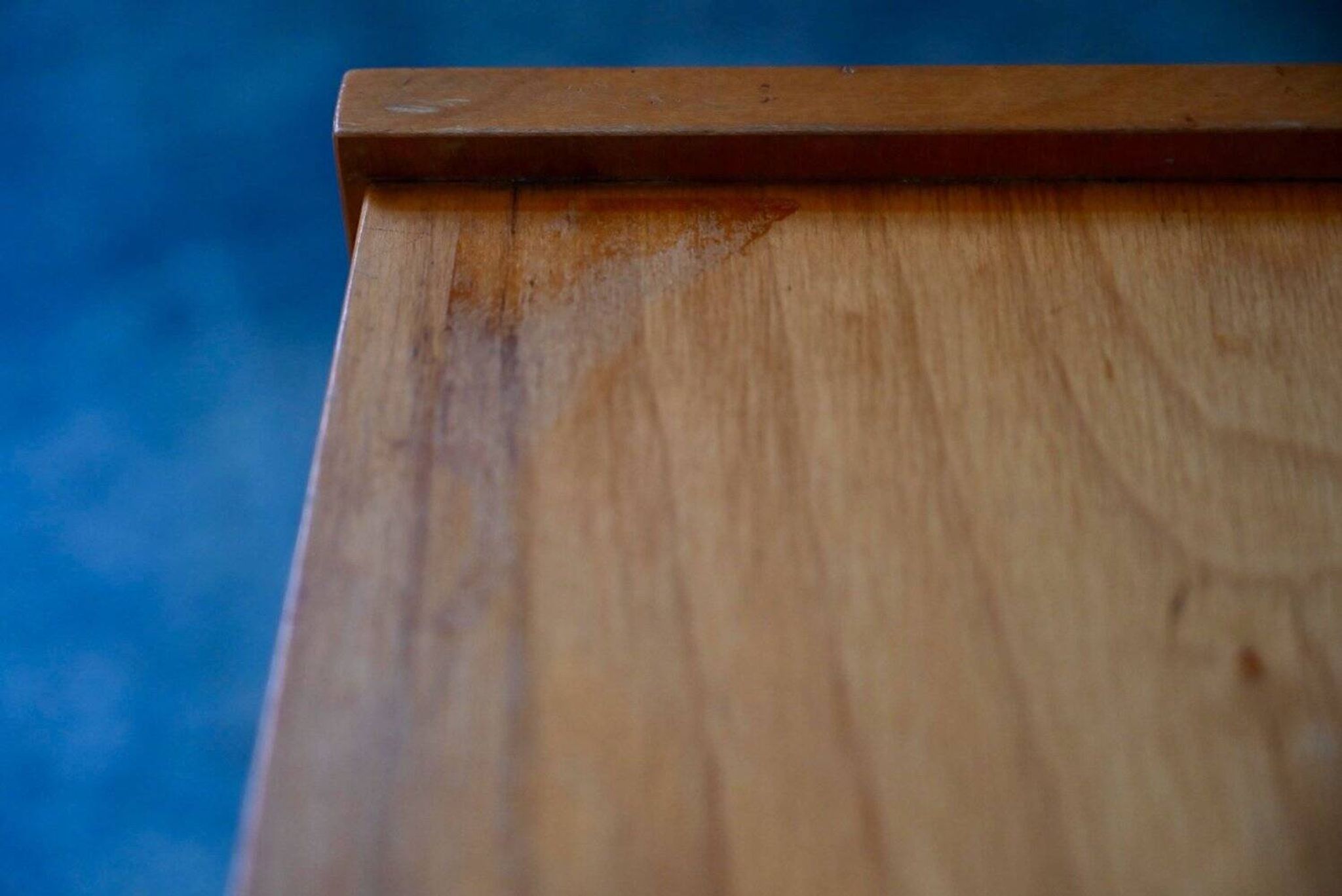 Rockabilly design bedside table with tapered legs.