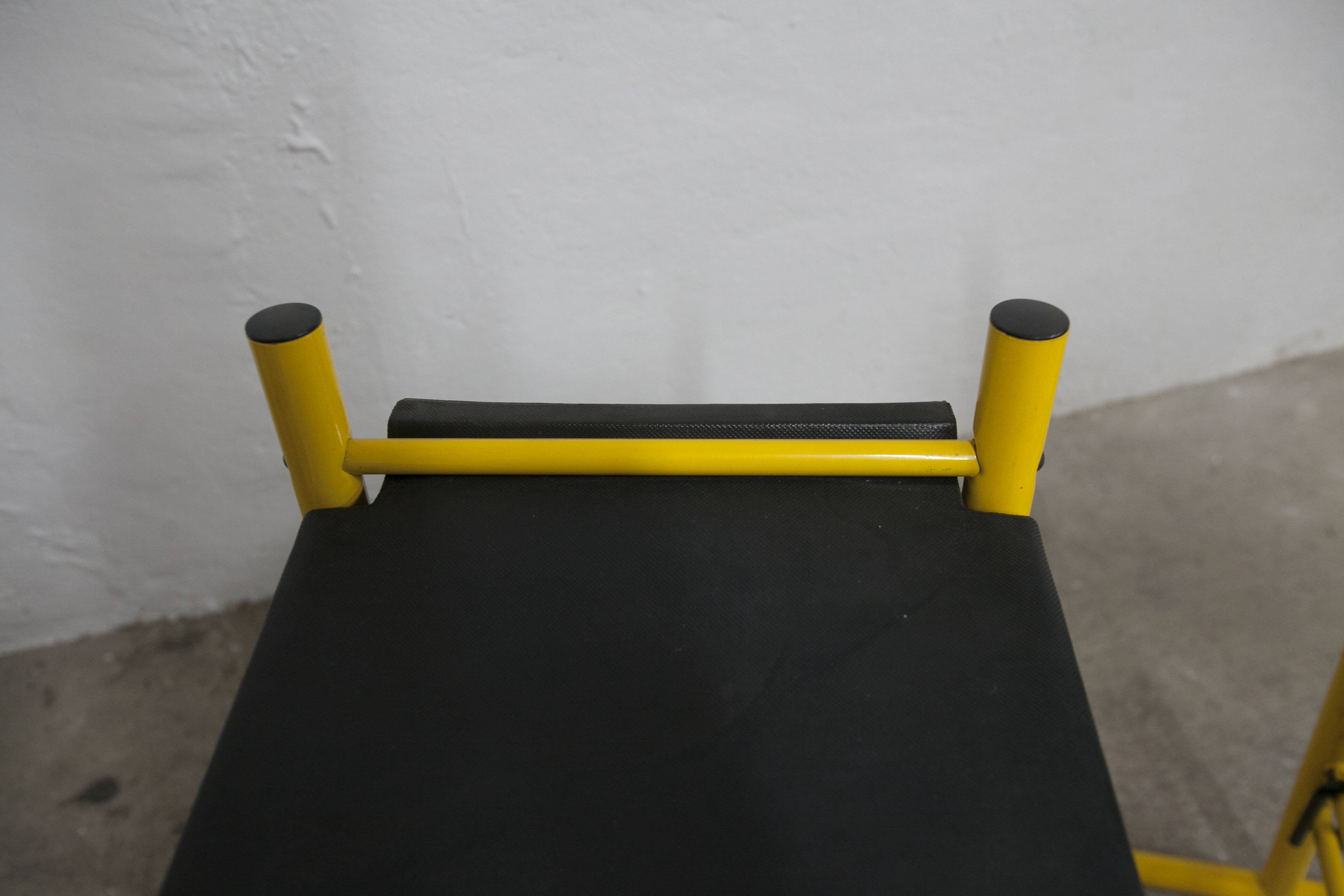 Pair of adjustable Italian bar stools in lacquered yellow and black