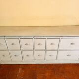 Solid wood sideboard with drawers.