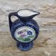 Blue ceramic vase with floral motifs