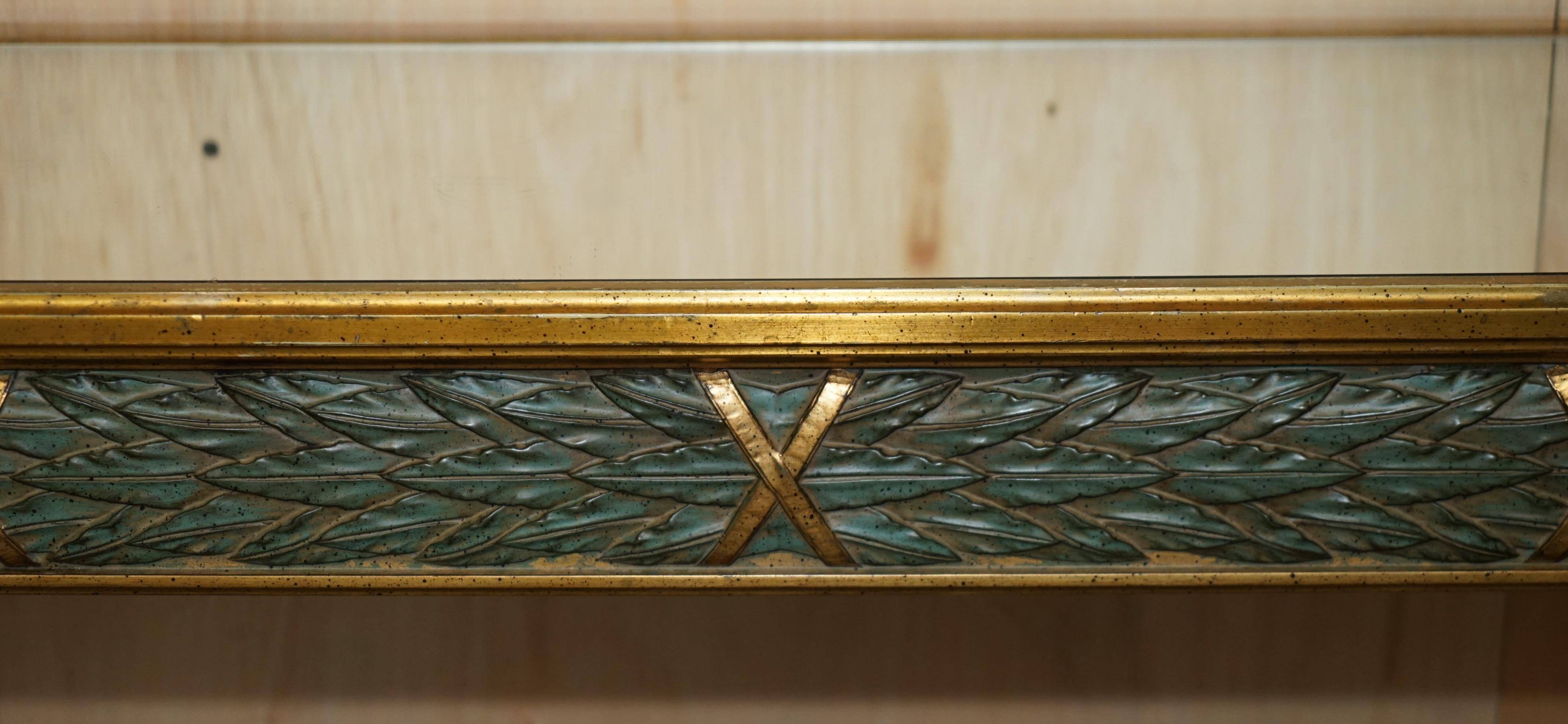 Italian vintage console with a glass mirror top.