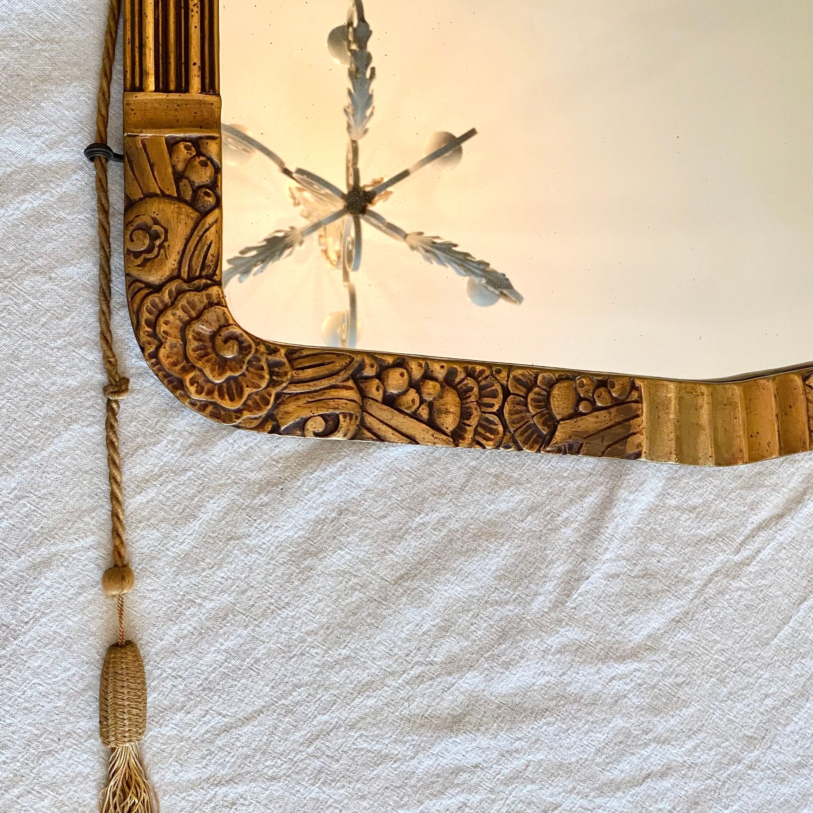 Golden art deco mirror