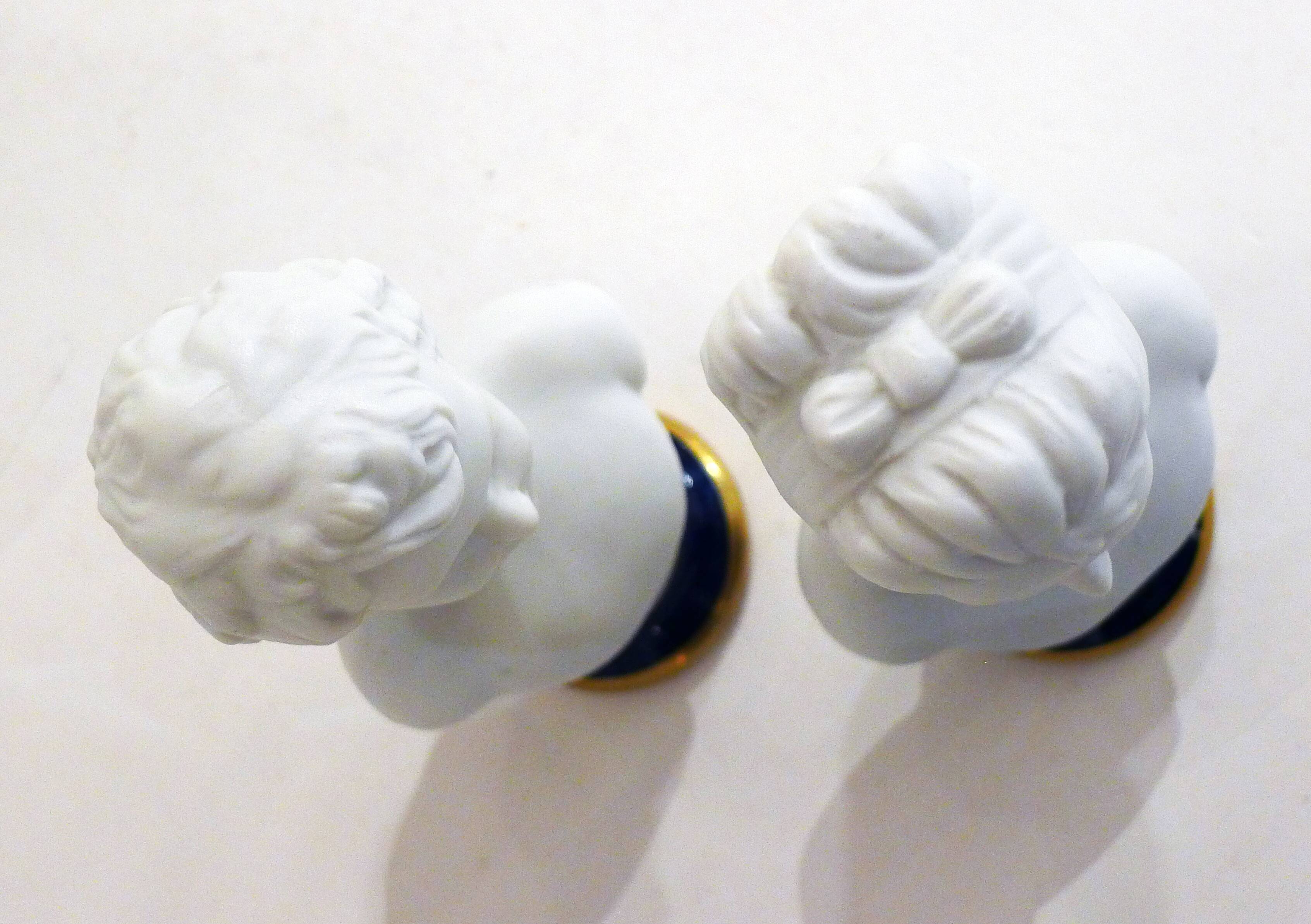 Pair of busts in biscuits