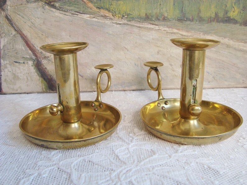 Pair of old brass candlesticks