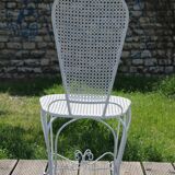 Two small wrought iron chairs