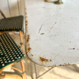 White folding metal bistro table