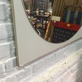Round mirror on laminated support