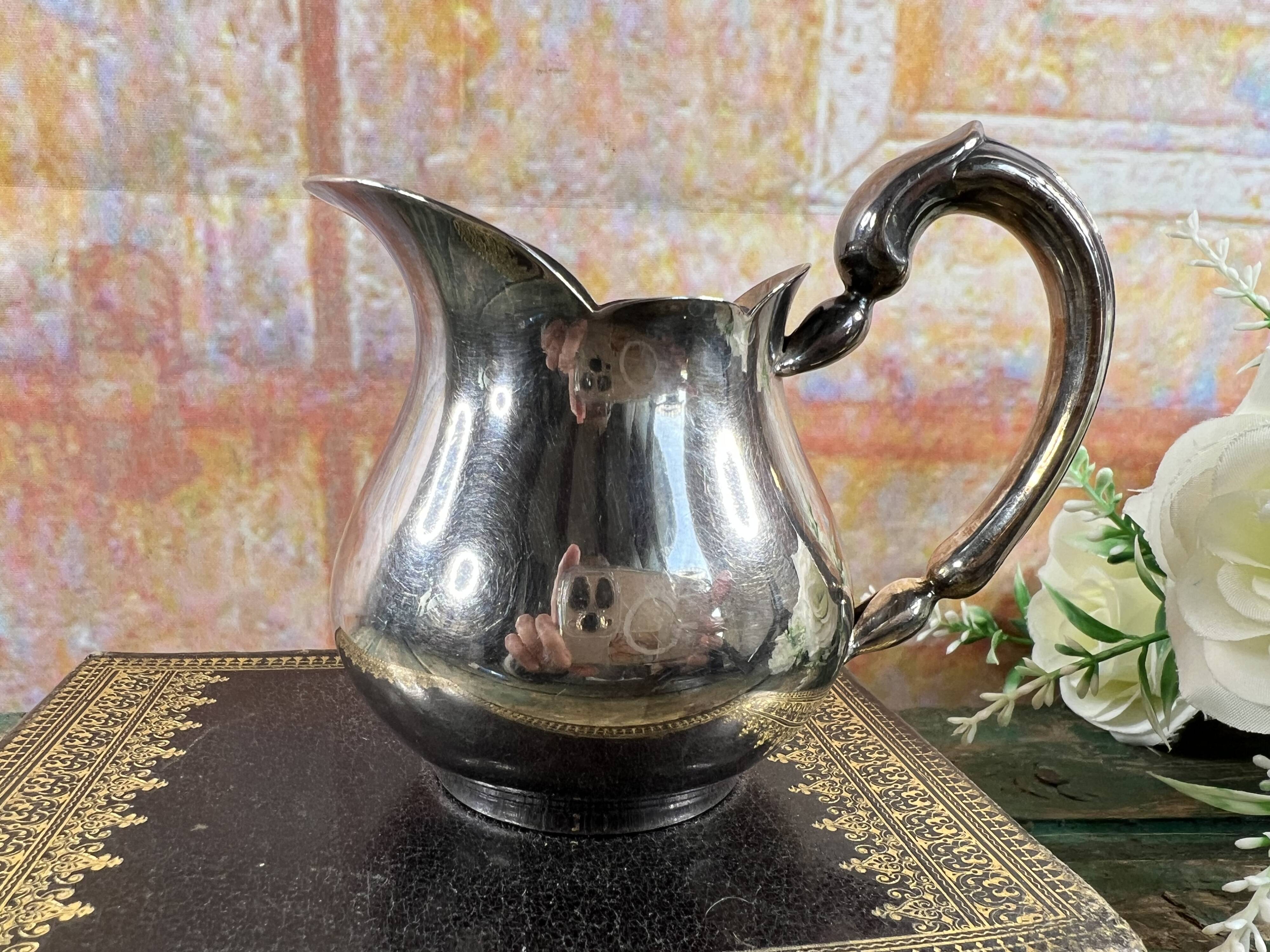 Small Christofle silver-plated metal ewer – Baluster model – France, 20th century