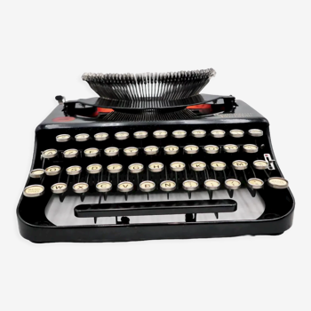 Machine à écrire Remington Portable usa années 20 révisée ruban neuf