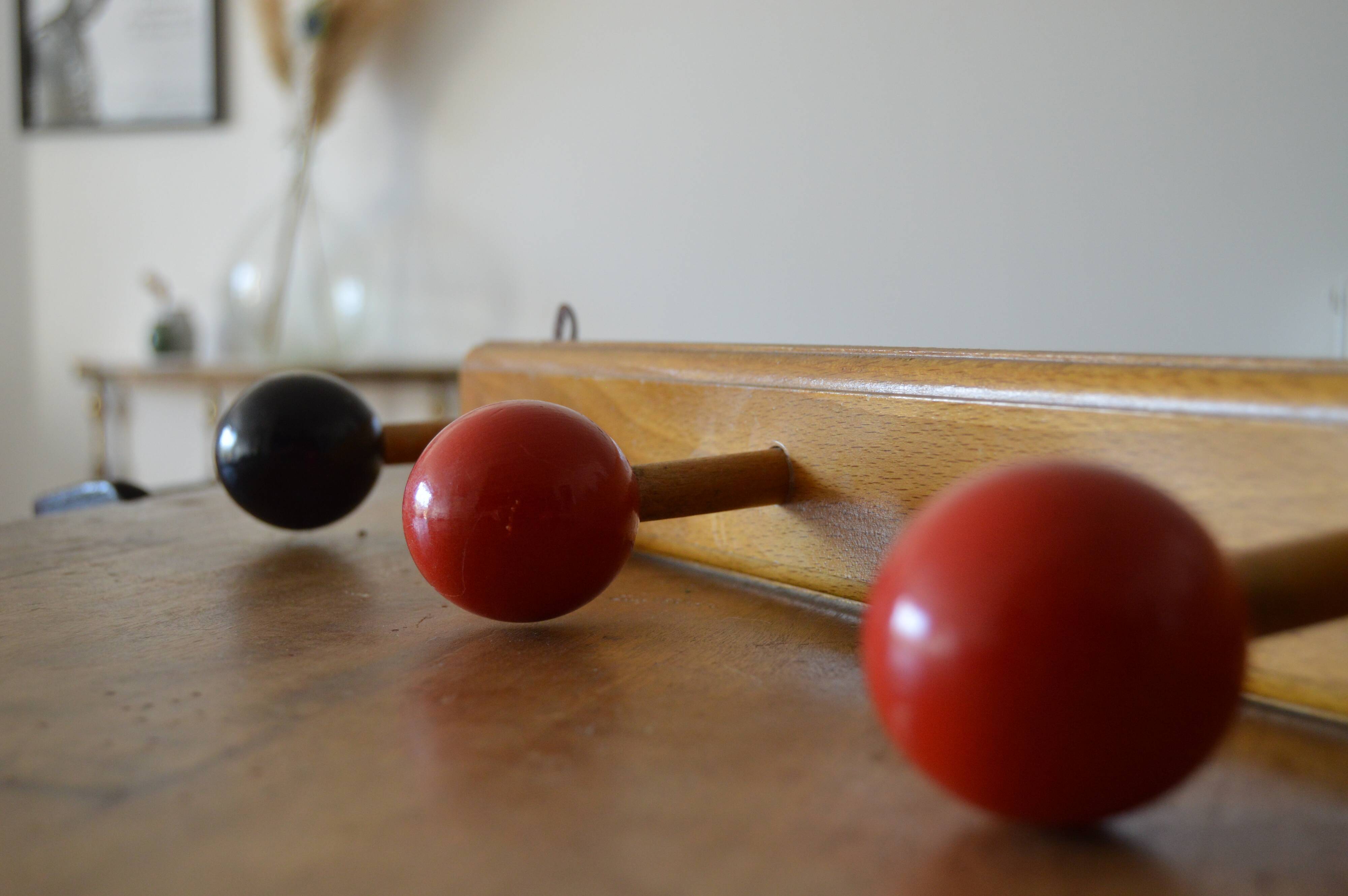 Vintage wooden hook with 4 racks painted red and black