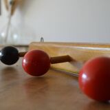 Vintage wooden hook with 4 racks painted red and black