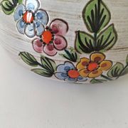 Glazed stoneware dish with floral motif