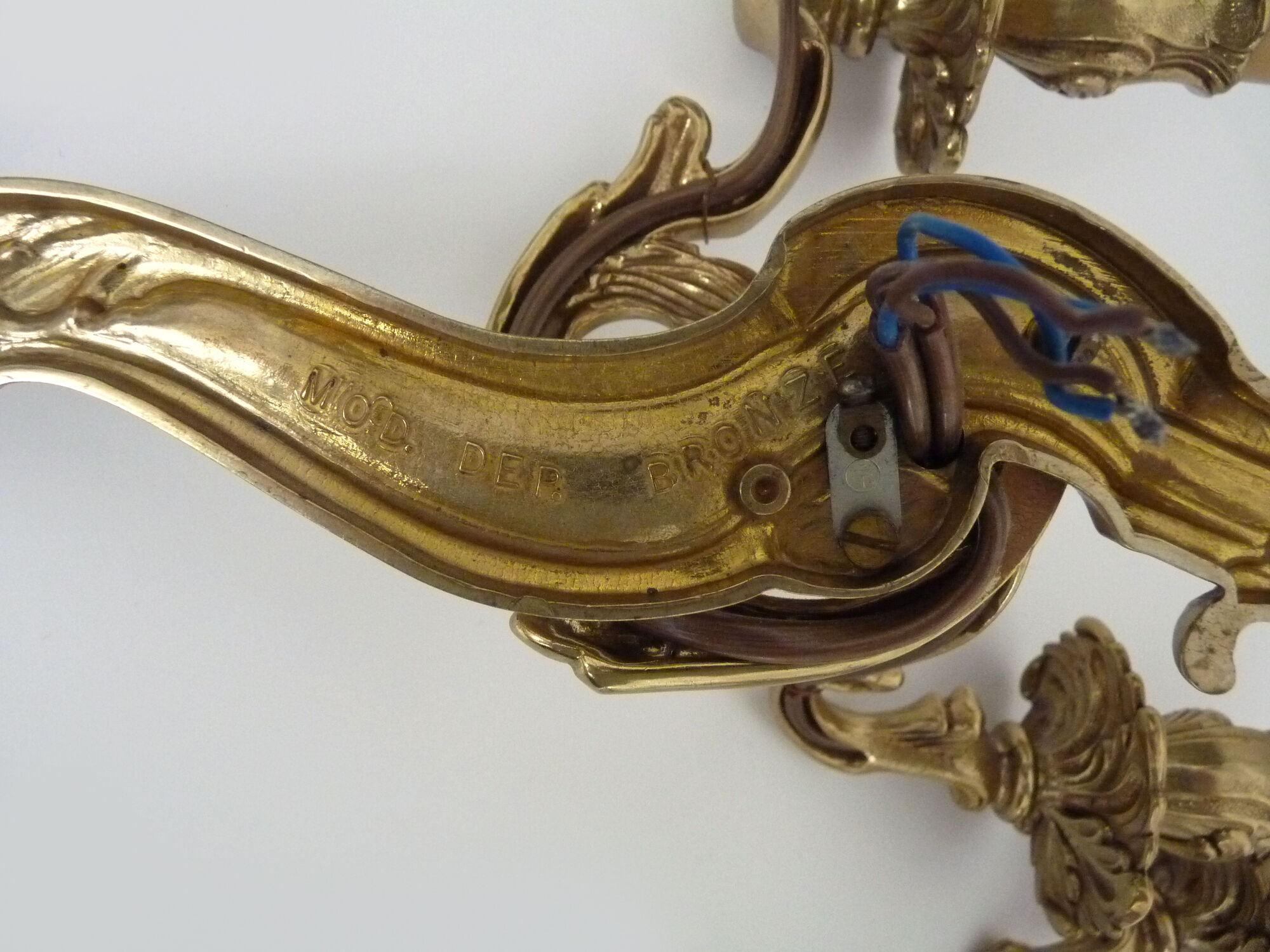 Old pair of wall sconces with double fires in bronze, 50s