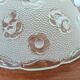 Moulded glass lampshade with floral decoration, granite texture.