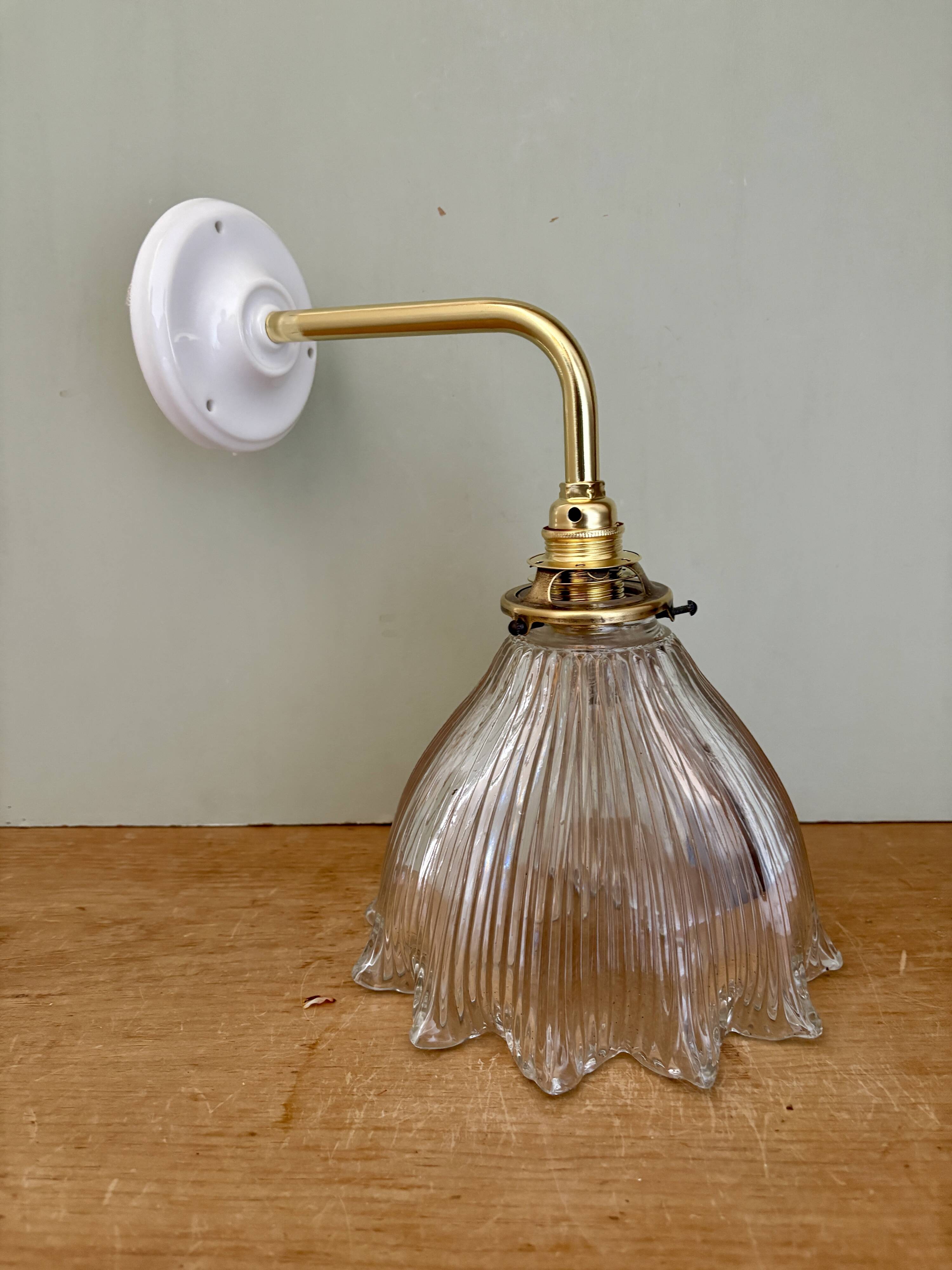 Elbow wall lamp with vintage holophane glass shade