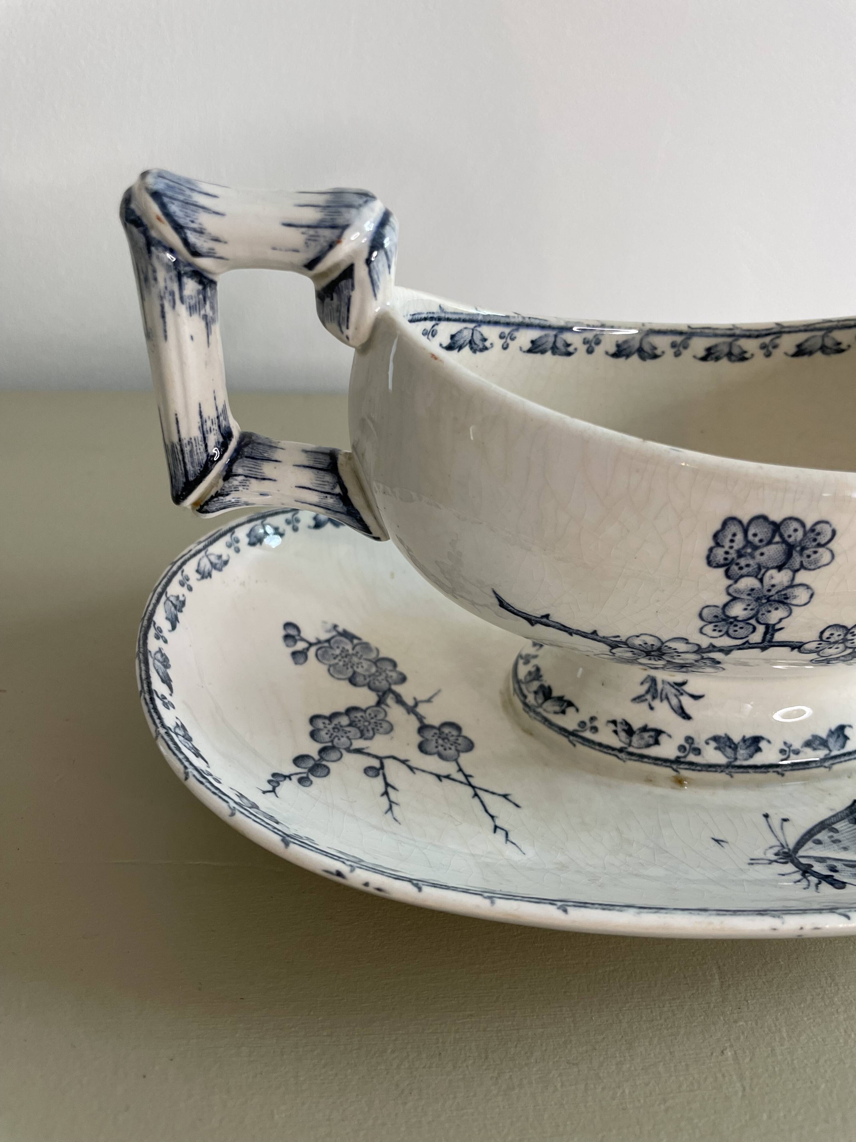 Sauce boat in blue iron earth Sarreguemines model Carmen