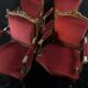 Pair of flat-back armchairs in Louis XV style in red velvet.