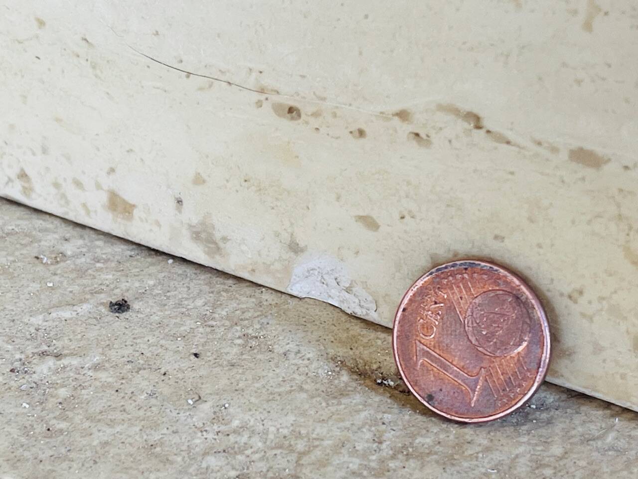 Vintage side table in travertine, circa 1980s.