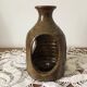 Brown stoneware tealight holder with handle