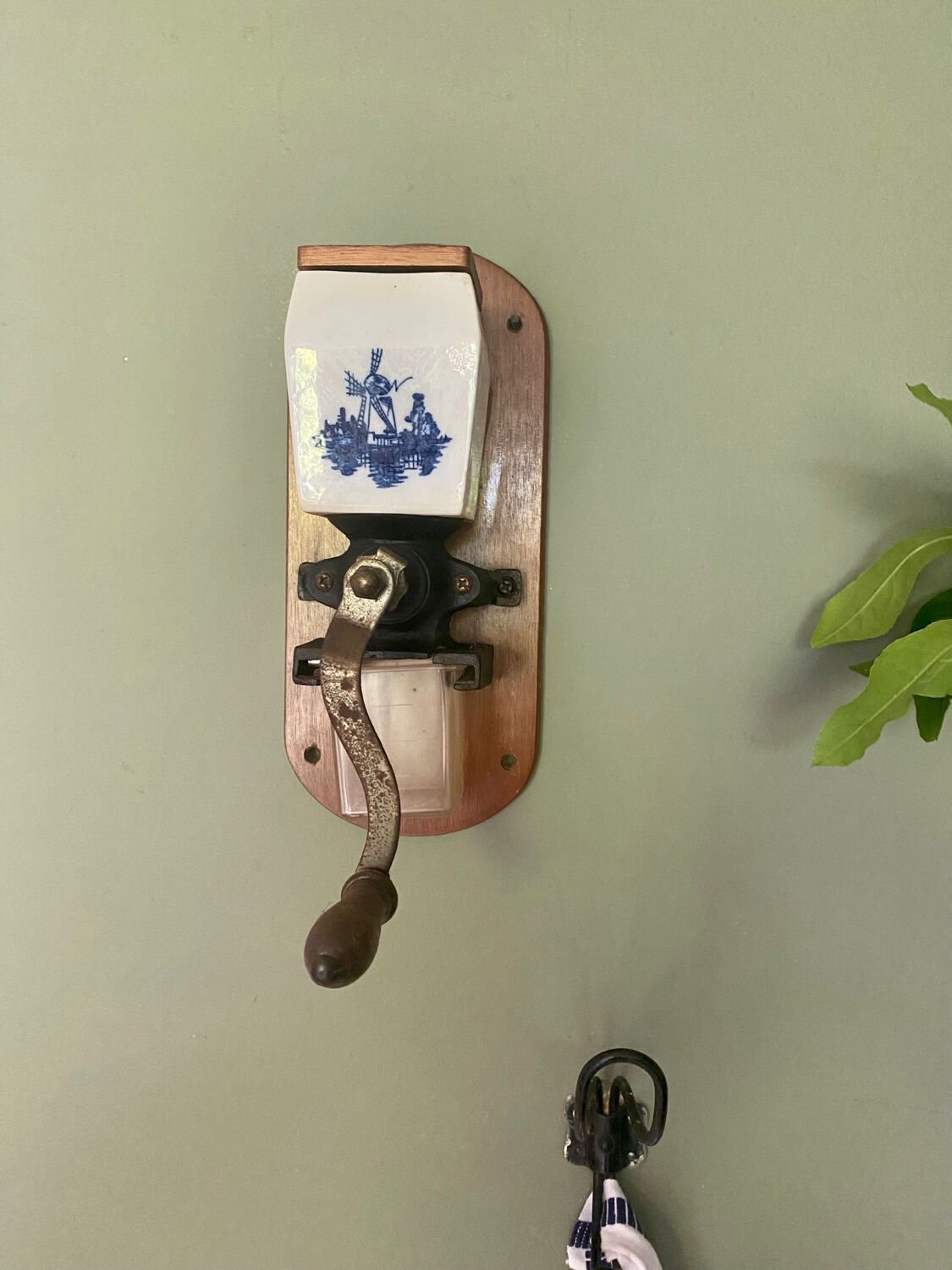 Old wall-mounted coffee grinder