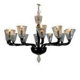 Venetian chandelier in Murano glass in black and colourless, 12 light arms, circa 1990.