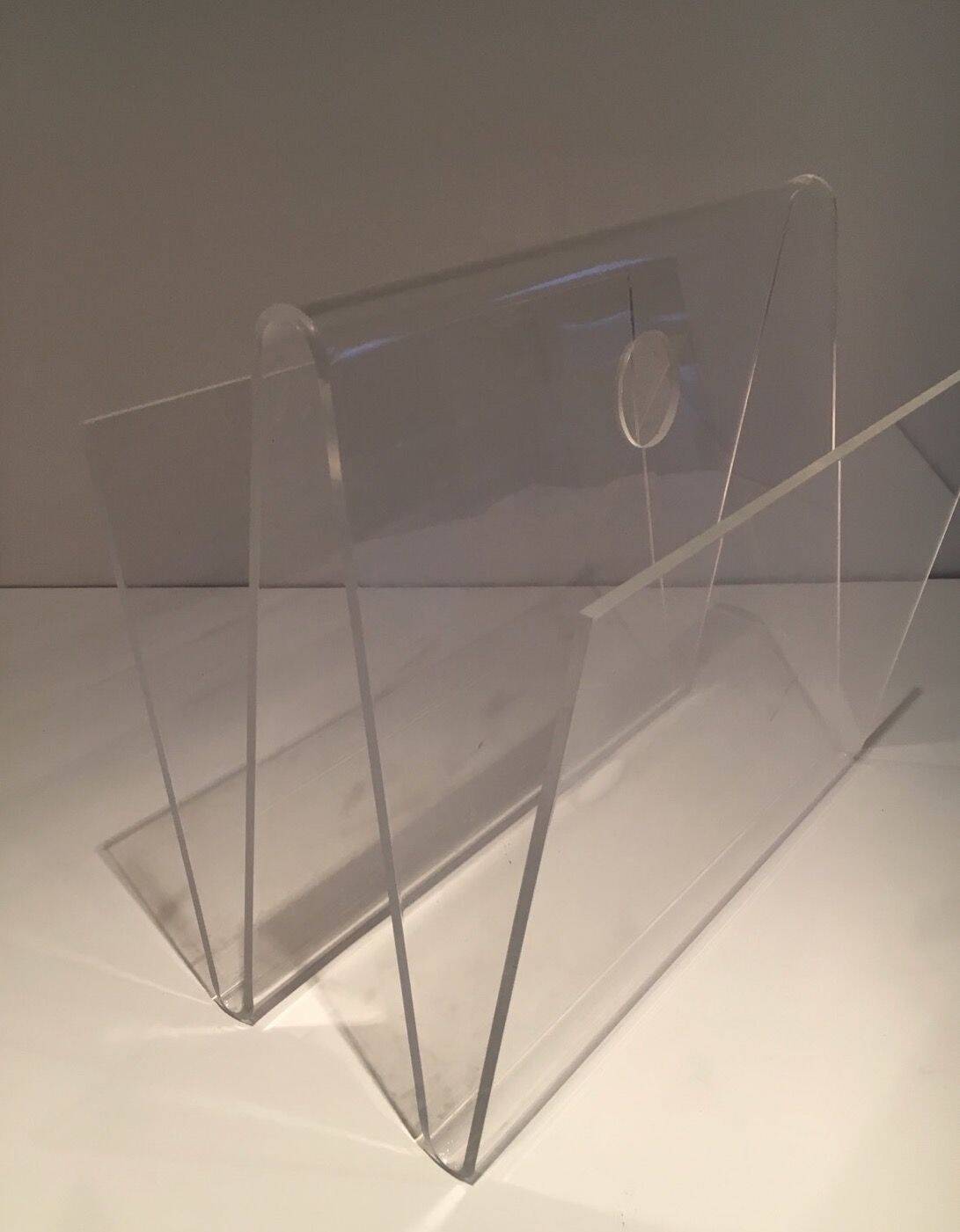 Acrylic magazine rack. Circa 1970.