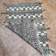 Small black Moroccan Berber Zanafi kilim rug for bedroom and living room.
