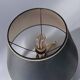 Brass reading floor lamp, adjustable arm, vintage anthracite shade.