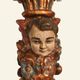 Renaissance table lamp in polychrome carved wood with cherubs.