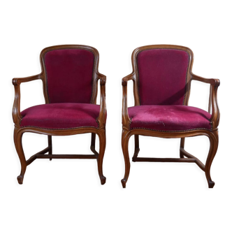 Pair of Louis XV convertible armchairs