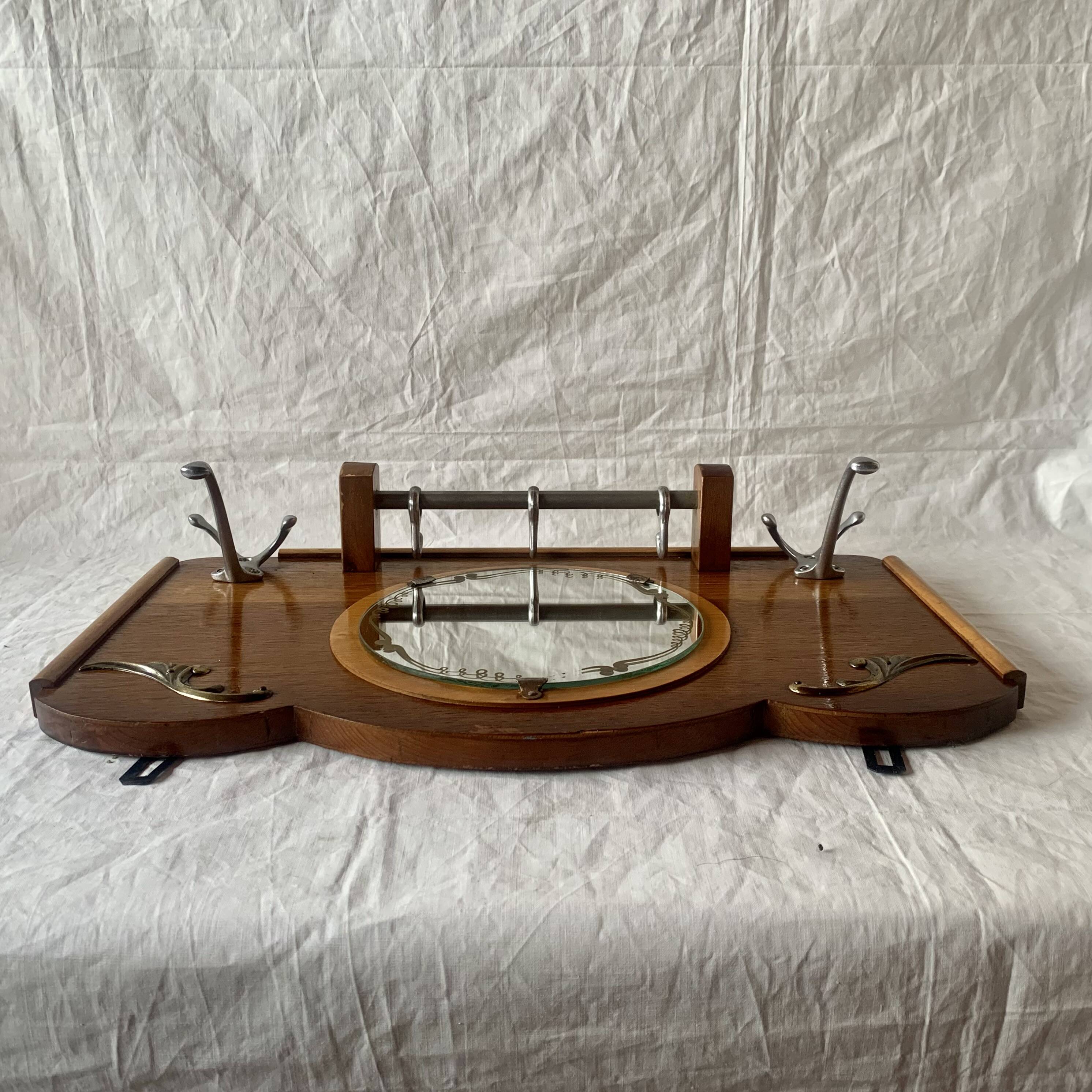 Art Deco wooden wall coat rack with round central mirror