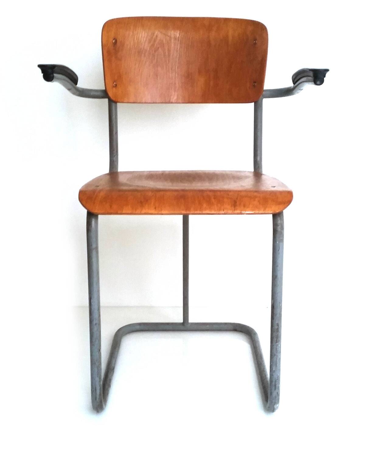 Dutch plywood vintage forties chair with bakelite armrests