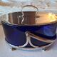 Silver-plated metal and blue glass biscuit jar