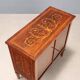 Antique neoclassical buffet veneered in various woods from the 1900s.