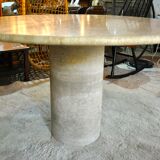 Round travertine table