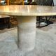 Round travertine table