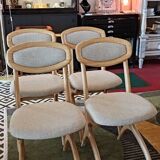 Four Scandinavian-style chairs